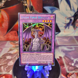 A Secret Rare "Doom Virus Dragon" card from the Yugioh Set: Dragons of Legend 2 (DRL2).