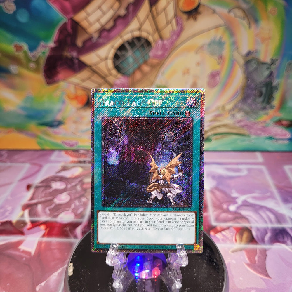 A Platinum Secret Rare "Draco Face-Off" card from the Yugioh Set: Quarter Century Stampede (RA04).