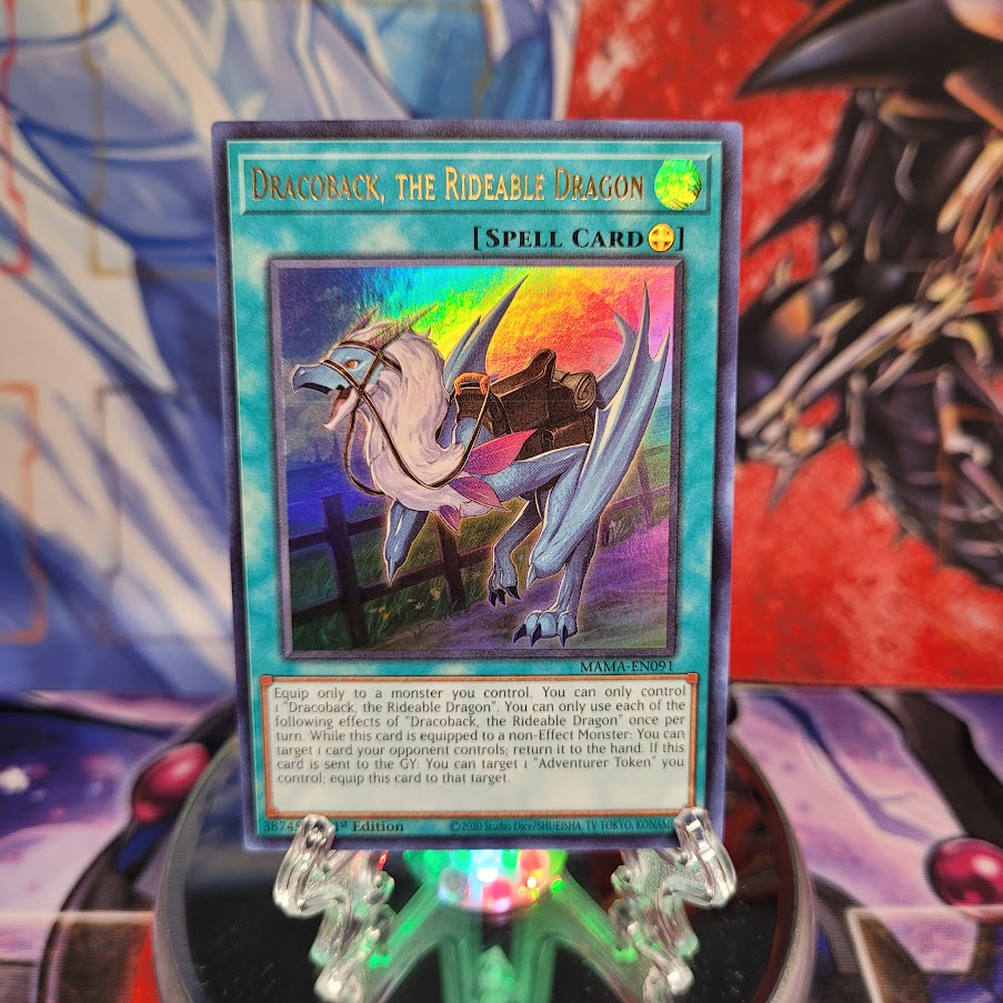 An Ultra Rare "Dracoback, the Rideable Dragon" card from the Yugioh Set: Magnificent Mavens.