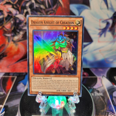 A Super Rare "Dragon Knight of Creation" card from the Yugioh Structure Deck: Rise of the True Dragons.