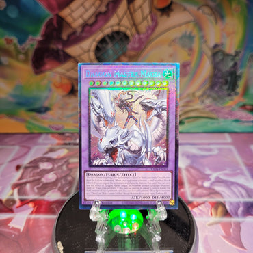 A Prismatic Collector's Rare "Dragon Master Magia" card from the Yugioh Set: Quarter Century Stampede (RA04).