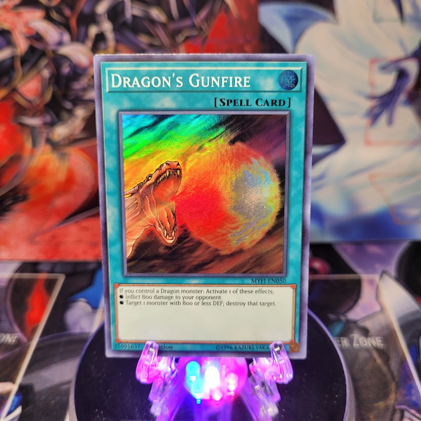 A Super Rare "Dragon's Gunfire" card from the Yugioh Set: Mystic Fighters.