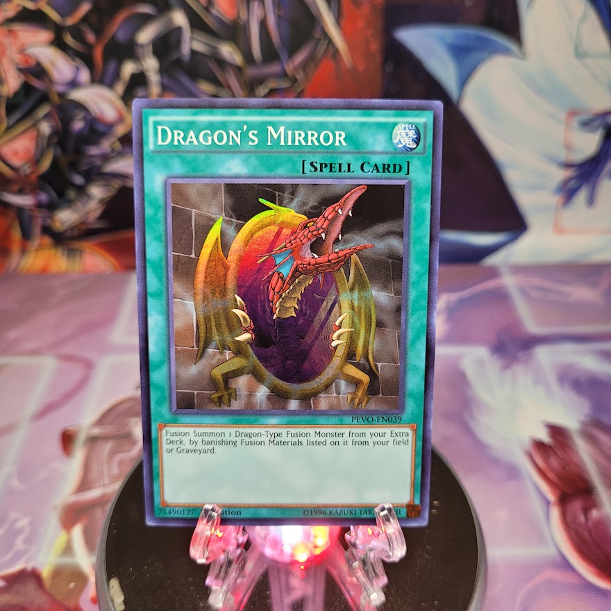 A Super Rare "Dragon's Mirror" card from the Yugioh Set: Pendulum Evolution (PEVO).