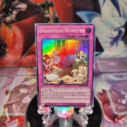 A Super Rare "Dragonmaid Downtime" card from the Yugioh Set: Mystic Fighters.