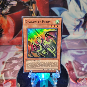 A Super Rare "Dragunity Pilum" card from the Yugioh Set: Hidden Arsenal 4: Trishula's Triumph.