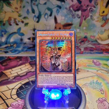 A Secret Rare "Dramaturge of Despia" card from the Yugioh 2022 Tin of the Pharaoh's Gods set (MP22).