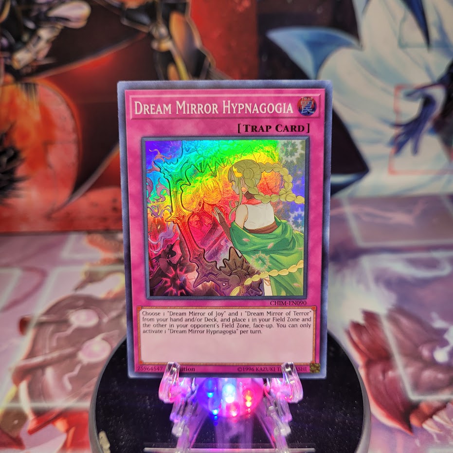 A Super Rare "Dream Mirror Hypnagogia" card from the Yugioh Set: Chaos Impact.