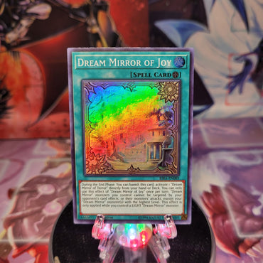 A Super Rare "Dream Mirror of Joy" card from the Yugioh Set: Rising Rampage.