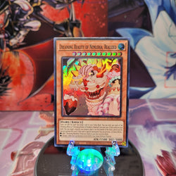 A Super Rare "Dreaming Reality of Nemleria, Realized" card from the Yugioh Set: Duelist Nexus.