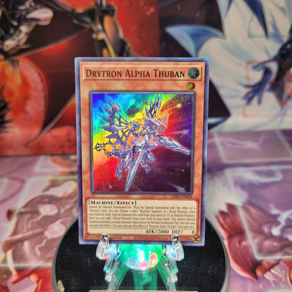 A Super Rare "Drytron Alpha Thuban" card from the Yugioh Set: Genesis Impact.