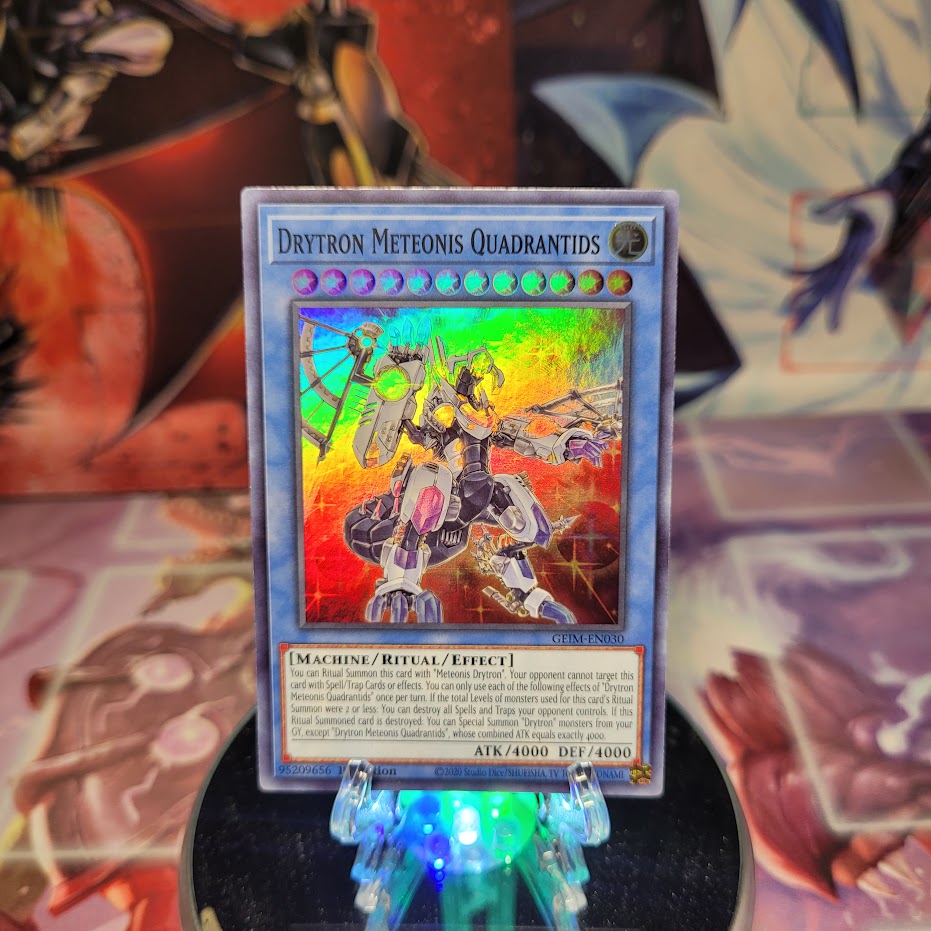 A Super Rare "Drytron Meteonis Quadrantids" card from the Yugioh Set: Genesis Impact.