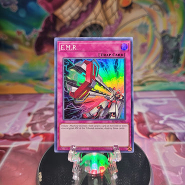 A Super Rare "E.M.R." card from the Yugioh Set: Blazing Vortex.