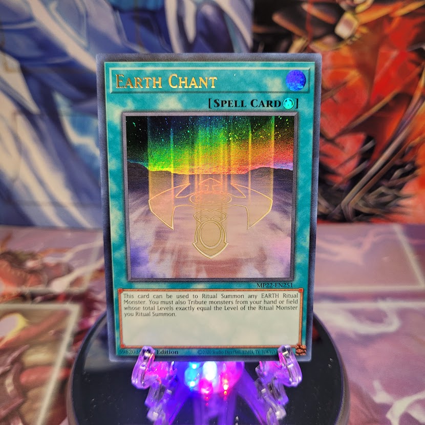 An Ultra Rare "Earth Chant" card from the Yugioh 2022 Tin of the Pharaoh's Gods Set (MP22).