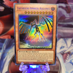 An Ultra Rare Blue "Earthbound Immortal Aslla Piscu" card from the Yugioh Set: Legendary Duelists: Season 3.