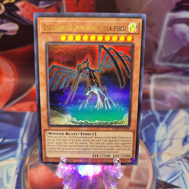 An Ultra Rare "Earthbound Immortal Aslla Piscu" card from the Yugioh Set: Legendary Duelists: Season 3.