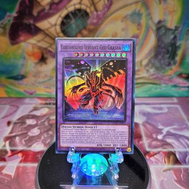 A Super Rare "Earthbound Servant Geo Grasha" card from the Yugioh Set: Maze of Millennia.