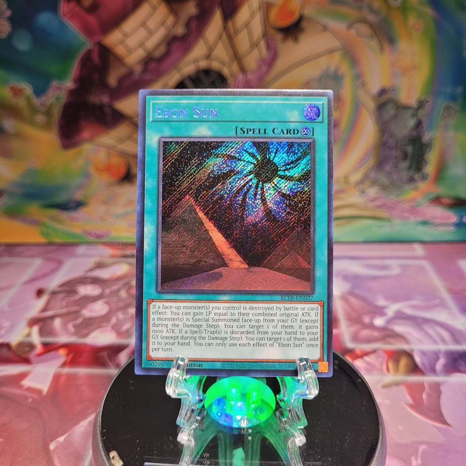 A Secret Rare "Ebon Sun" card from the Yugioh Set: Battles of Legend: Terminal Revenge.