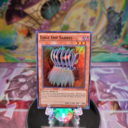 A Super Rare "Edge-Imp Sabres" card from the Yugioh Set: Fusion Enforcers (FUEN).