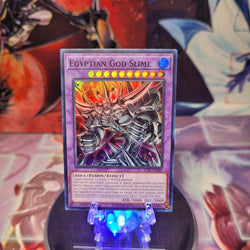 A Super Rare "Egyptian God Slime" card from the Yugioh Set: Rarity Collection 1 (RA01). 