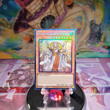 A Prismatic Collector's Rare "Ehther the Heavenly Monarch" card from the Yugioh Set: Quarter Century Stampede  (RA04).