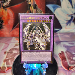 An Ultimate Rare "El Shaddoll Shekhinaga" card from the Yugioh Set: The New Challengers (NECH).