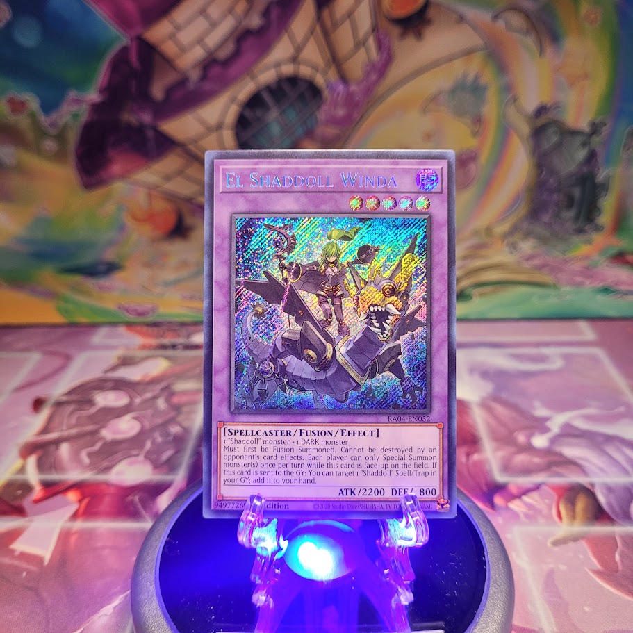 A Secret Rare "El Shaddoll Winda" card from the Yugioh Set: Quarter Century Stampede (RA04).