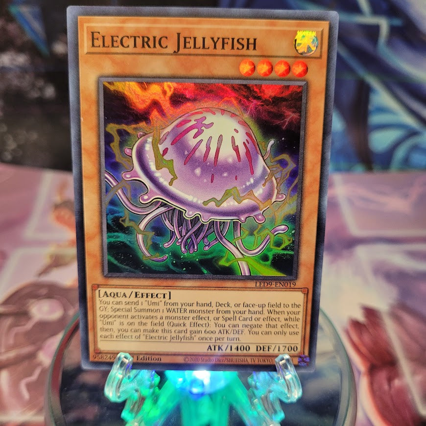  A Super Rare "Electric Jellyfish" card from the Yugioh Set: Legendary Duelists: Duels From the Deep.