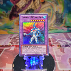 A Super Rare "Elemental Hero Aqua Neos" card from the Yugioh Set: Legendary Collection 2 (LCGX).