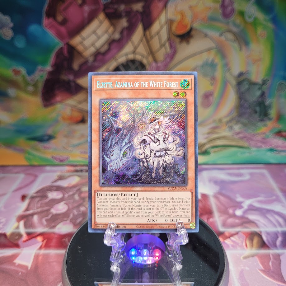 A Secret Rare "Elzette, Azamina of the White Forest" card from the Yugioh Set: Supreme Darkness (SUDA).