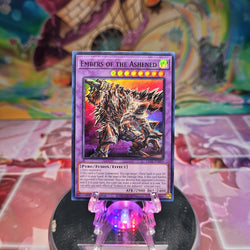 A Super Rare "Embers of the Ashened" card from the Yugioh Set: Legacy of Destruction.