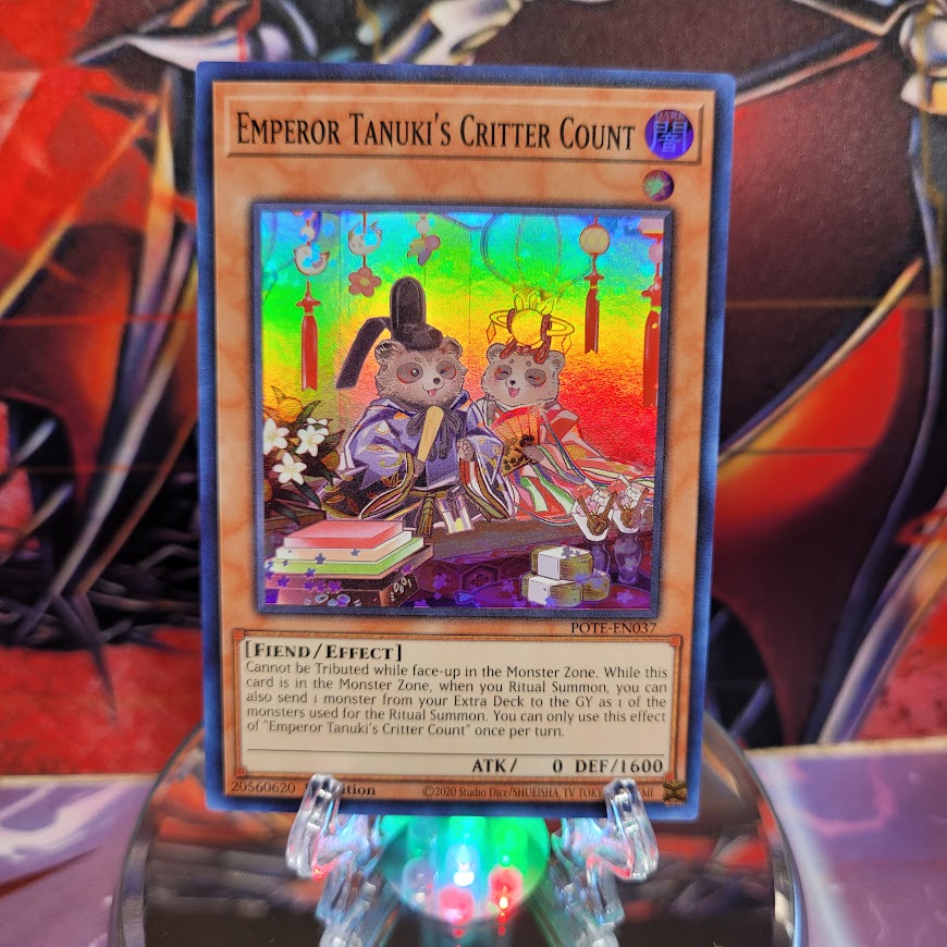 A Super Rare "Emperor Tanuki's Critter Count" card from the Yugioh Set: Power of the Elements (POTE).