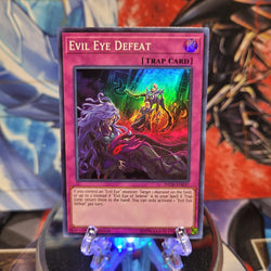  A Super Rare "Evil Eye Defeat" card from the Yugioh Set: The Infinity Chasers.