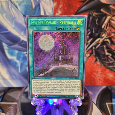  A Secret Rare "Evil Eye Domain - Pareidolia" card from the Yugioh Set: The Infinity Chasers.