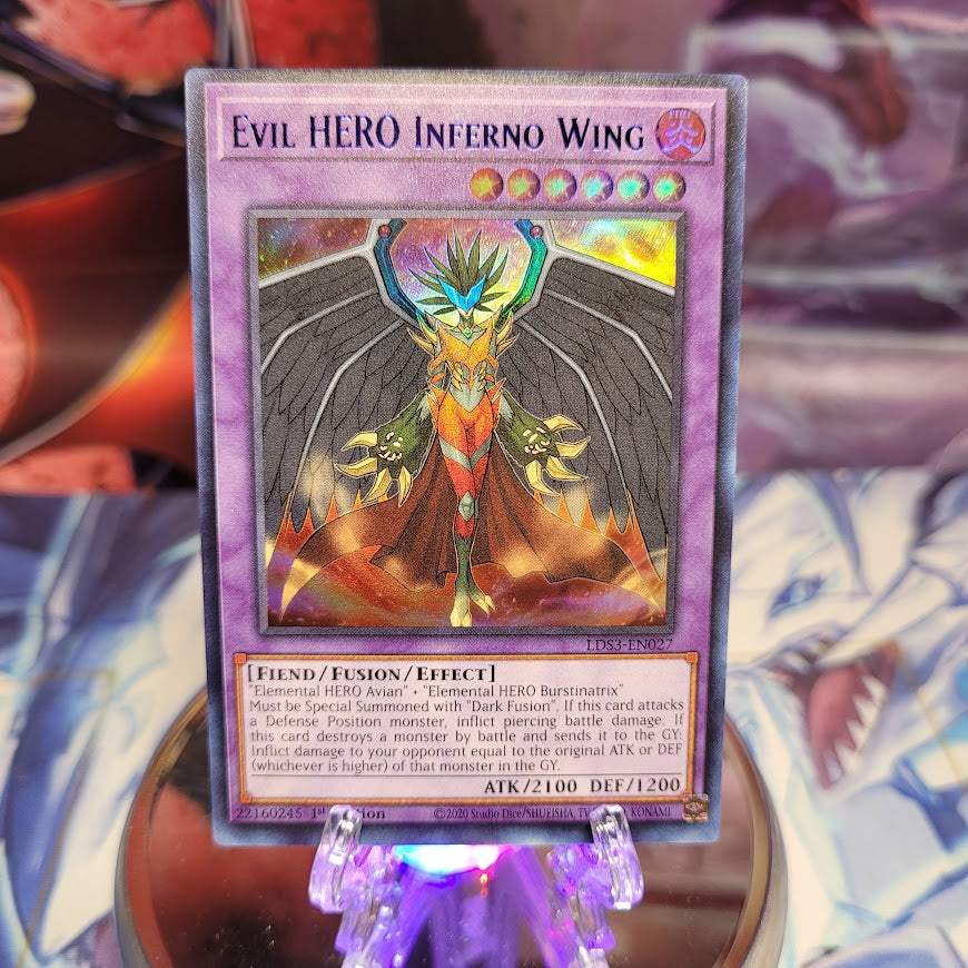 An Ultra Rare Blue "Evil Hero Inferno Wing" card from the Yugioh Set: Legendary Duelists: Season 3.