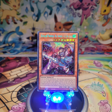 A Secret Rare "Evil Twins Ki-sikil & Lil-la" card from the Yugioh Set: Quarter Century Stampede (RA04).