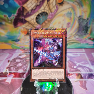 A Platinum Secret Rare "Evil Twins Ki-Sikil & Lil-La" card from the Yugioh Set: Quarter Century Stampede (RA04).