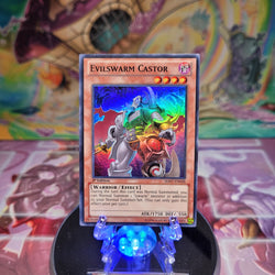 A Super Rare "Evilswarm Castor" card from the Yugioh Set: Hidden Arsenal 7: Knight of Stars (HA07).