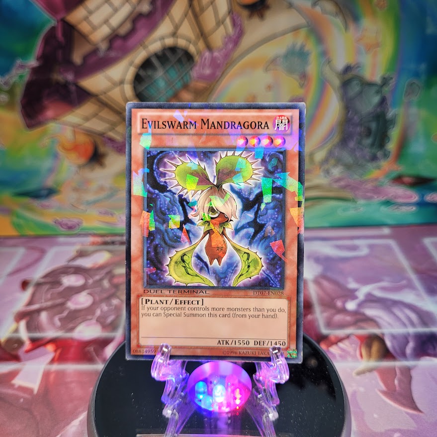 A Common Duel Terminal "Evilswarm Mandragora" card from the Yugioh Set: Duel Terminal 7 (DT07).