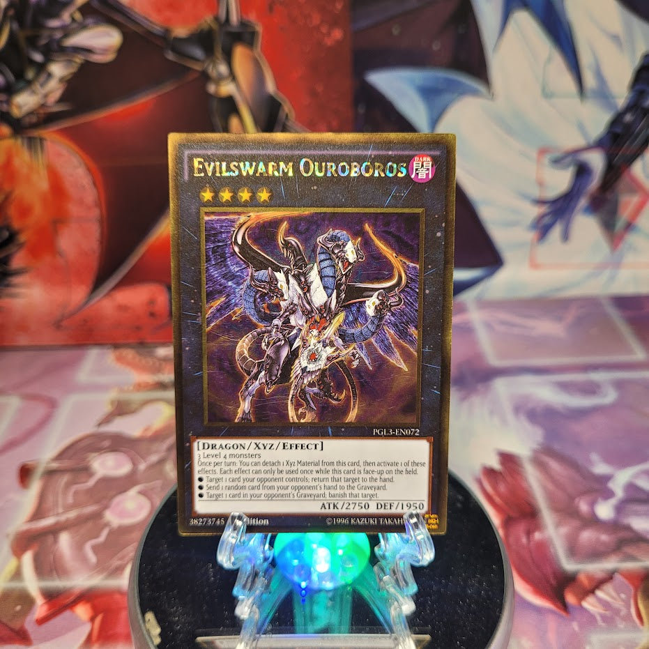 A Gold Rare "Evilswarm Ouroboros" card from the Yugioh Set: Premium Gold: Infinite Gold (PGL3).