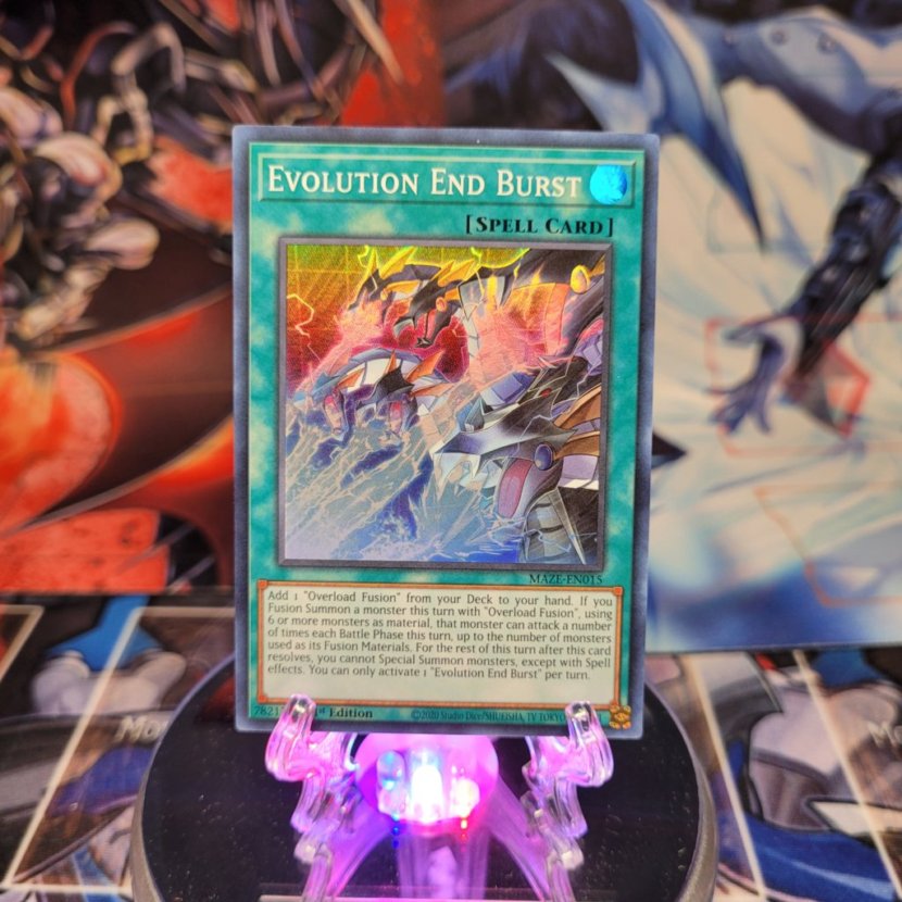 A Super Rare "Evolution End Burst" card from the Yugioh Set: Maze of Memories.