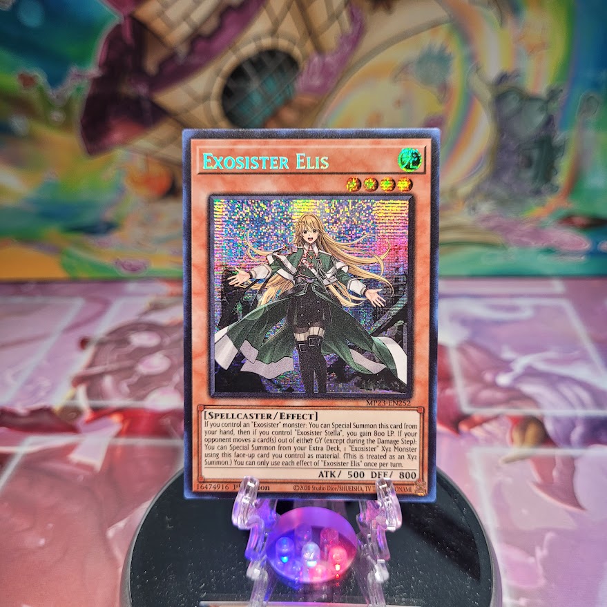 A Prismatic Secret Rare "Exosister Elis" card from the Yugioh Dueling Heroes Mega-Tin Mega Pack.