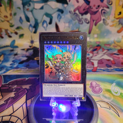 An Ultra Rare "Exosisters Magnifica" card from the Yugioh Set: Magnificent Monsters (MAMO).