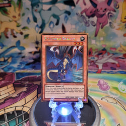 A Gold Rare "Exploder Dragon" card from the Yugioh Set: Premium Gold (PGLD).