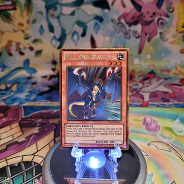 A Gold Rare "Exploder Dragon" card from the Yugioh Set: Premium Gold (PGLD).