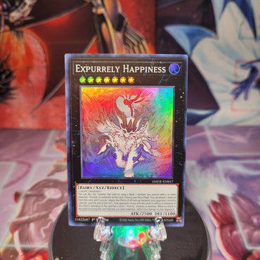 A Super Rare "Expurrely Happiness" card from the Yugioh Set: Amazing Defenders.