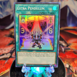  A Super Rare "Extra Pendulum" card from the Yugioh Set: Dimension Force.