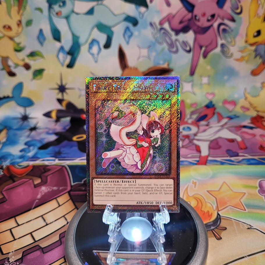 A Platinum Secret Rare "Fairy Tail - Snow" card from the Yugioh Set: Quarter Century Stampede (RA04).