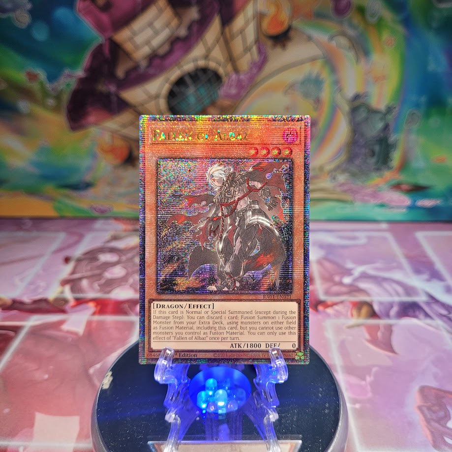 A Quarter Century Secret Rare "Fallen of Albaz" card from the Yugioh Set: Rarity Collection 1 (RA01).