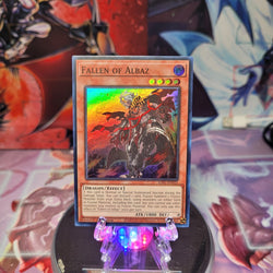 A Super Rare "Fallen of Albaz" card from the Yugioh Set: Rarity Collection 1 (RA01).