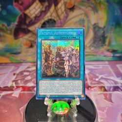 A Prismatic Secret Rare "Fateful Adventure" card from the Yugioh Set: 25th Anniversary Tin: Dueling Heroes Mega-Tin Mega Pack.